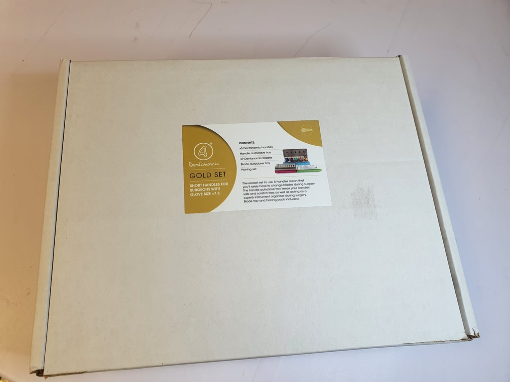 DENTANOMIC Set – Gold, bestehend aus 5 Standard Handgriffen (lila, orange, grün, blau und rosa) + Elevator- und Luxator-Klingen Set (9 Stück) + Aufbewahrungsrack + Schleifset + Sterilisationsbehälter - Die Originalverpackung ist leicht beschädigt; zudem weisen drei der Handgriffe Gebrauchsspuren auf.